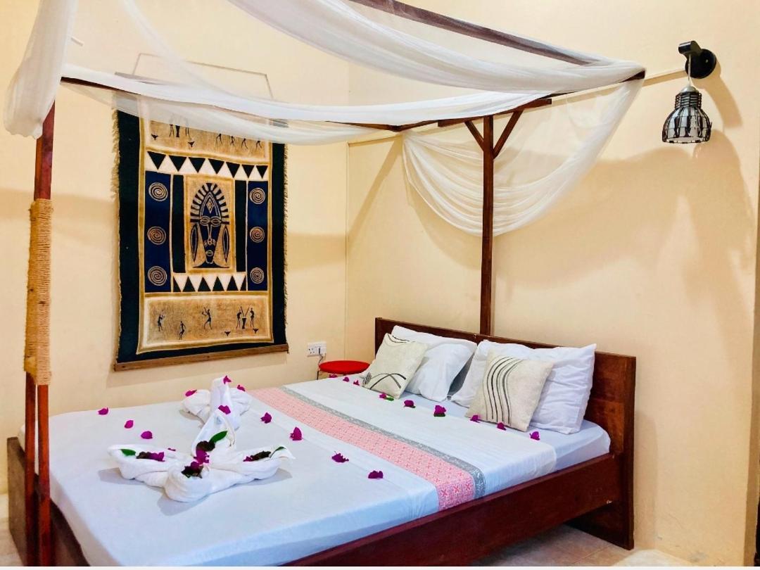 Bwejuu Beach Palm Villa Kamer foto